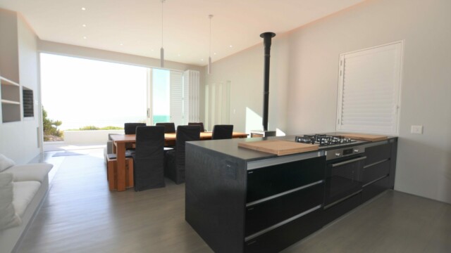 open kitchen area and dining table Beach Tower Cottage
